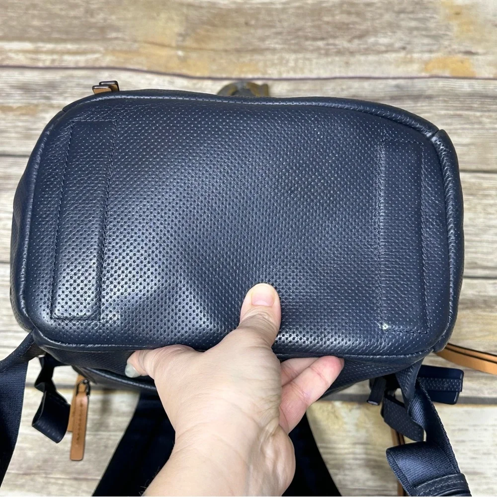 Tumi Navy Perforated Leather Backpack with Tan Handles